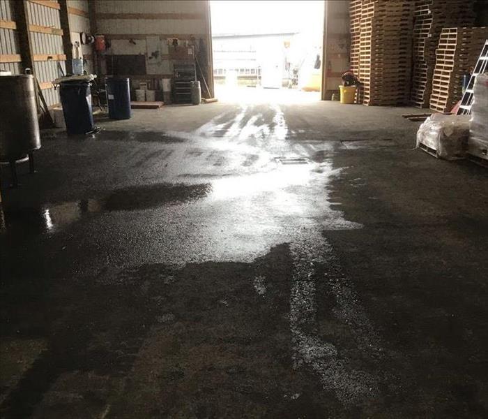 Water on the floor of a warehouse in Lacey, WA