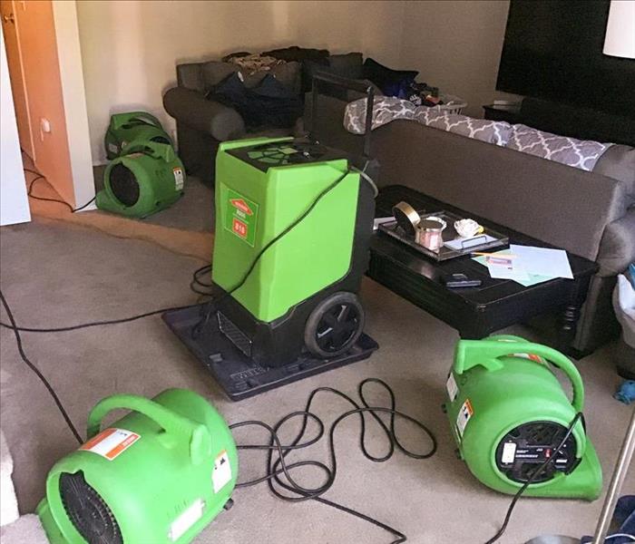 SERVPRO equipment set up in an Olympia home to dry a carpet
